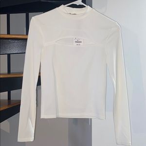 White mock neck top with cutout